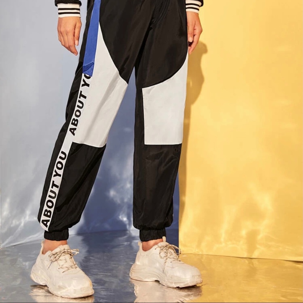 About you side slogan wind pants